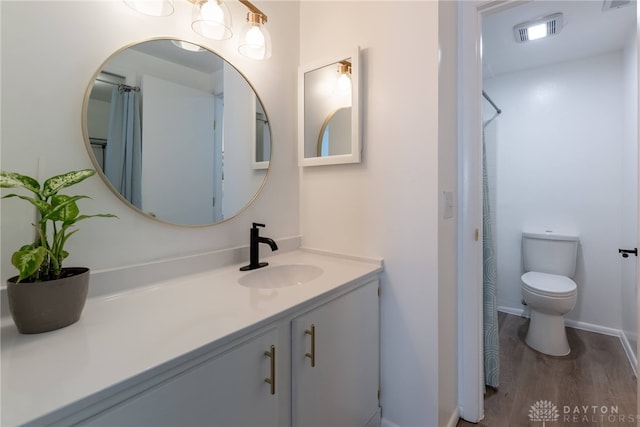 1743 Running Brook Trl Unit C, West Carrollton, OH 45449 - full bath featuring vanity, toilet, wood finished floors, and curtained shower