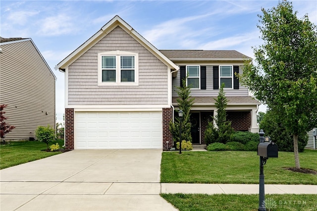 148 Oasis Ct, Springboro, OH 45066 - view of front facade with an attached garage, concrete driveway, a front yard, brick siding, and roof with shingles