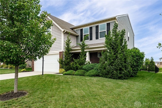 148 Oasis Ct, Springboro, OH 45066 - view of front facade featuring driveway, brick siding, and a garage