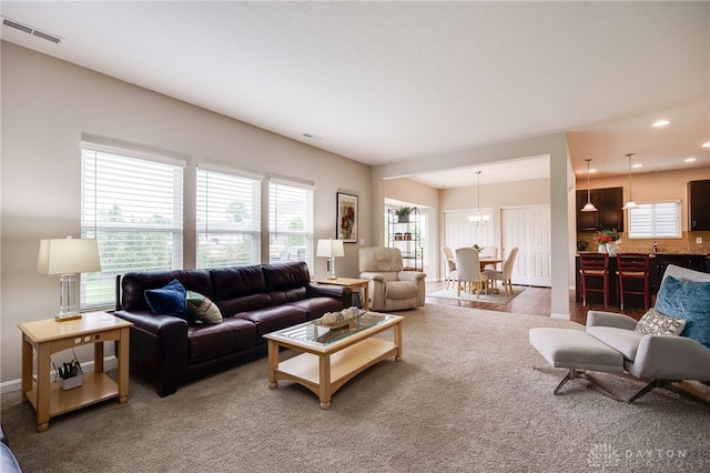 148 Oasis Ct, Springboro, OH 45066 - living area featuring carpet, recessed lighting, and a chandelier