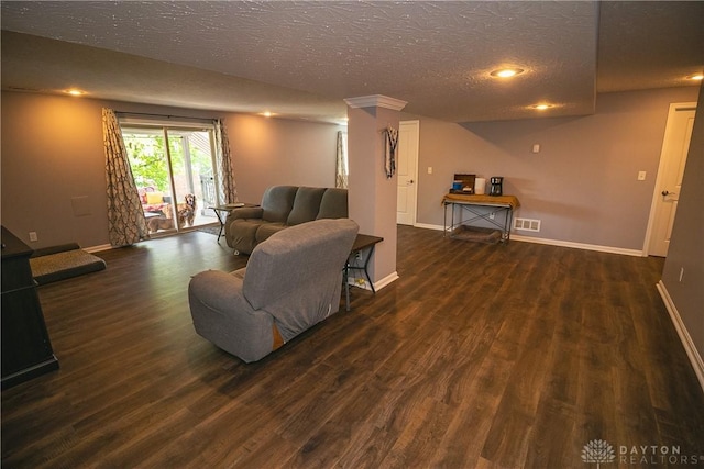 1331 Peregrine Way, Hamilton, OH 45013 - living area with wood finished floors, baseboards, a textured ceiling, and recessed lighting
