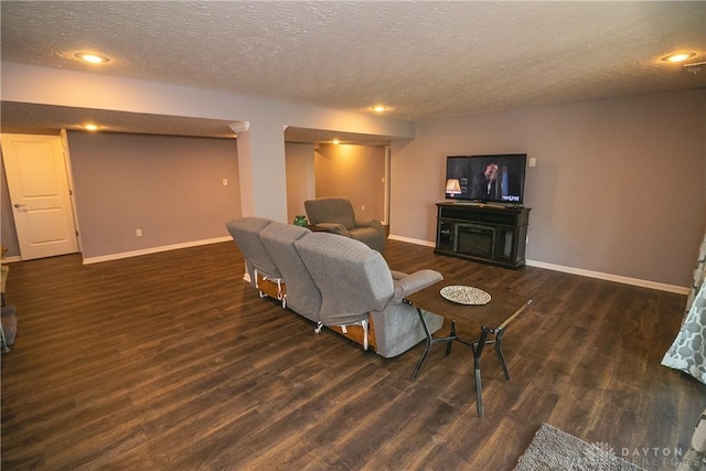 1331 Peregrine Way, Hamilton, OH 45013 - living room with baseboards, a textured ceiling, dark wood-style flooring, and recessed lighting