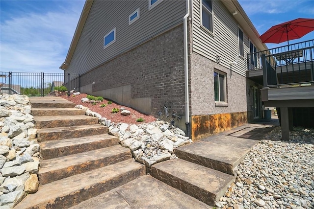1331 Peregrine Way, Hamilton, OH 45013 - view of property exterior featuring brick siding and a balcony