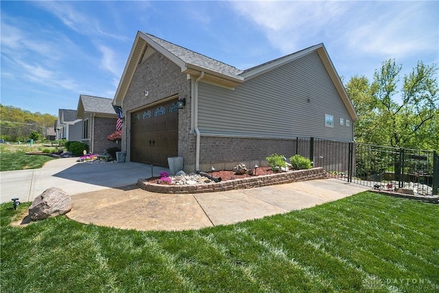 1331 Peregrine Way, Hamilton, OH 45013 - view of home's exterior with a garage and driveway