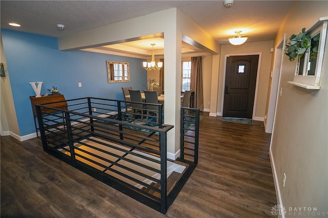 1331 Peregrine Way, Hamilton, OH 45013 - entrance foyer featuring baseboards, wood finished floors, a chandelier, a raised ceiling, and recessed lighting