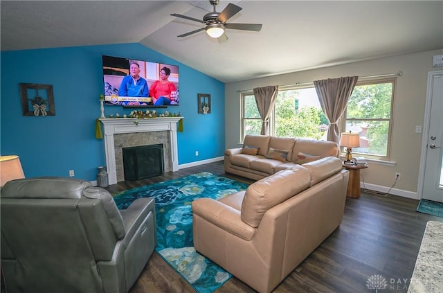 1331 Peregrine Way, Hamilton, OH 45013 - living room featuring dark wood finished floors, a ceiling fan, lofted ceiling, a premium fireplace, and baseboards