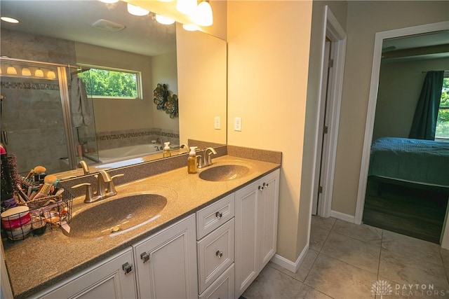 1331 Peregrine Way, Hamilton, OH 45013 - bathroom with a garden tub, connected bathroom, tile patterned floors, a stall shower, and double vanity