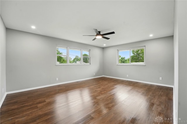 3040 Fontano Dr, Kettering, OH 45440 - spare room featuring ceiling fan, baseboards, dark wood-type flooring, and recessed lighting