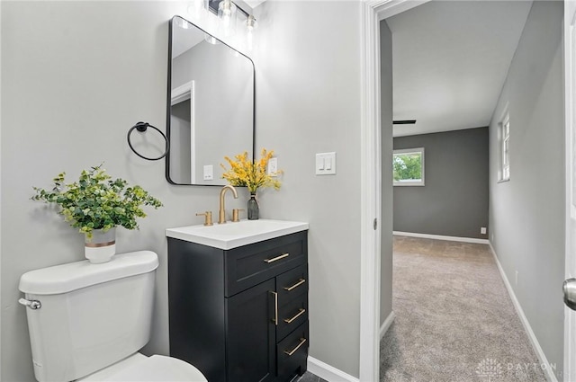 3040 Fontano Dr, Kettering, OH 45440 - bathroom with toilet, vanity, and baseboards