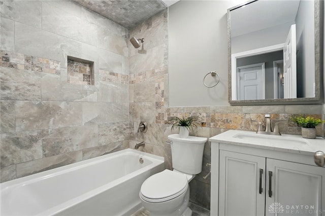 3040 Fontano Dr, Kettering, OH 45440 - full bathroom with washtub / shower combination, vanity, toilet, and tile walls