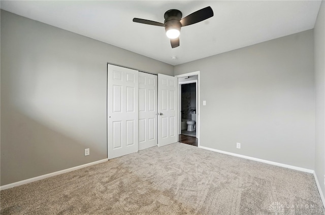 3040 Fontano Dr, Kettering, OH 45440 - unfurnished bedroom featuring carpet flooring, baseboards, a closet, and a ceiling fan