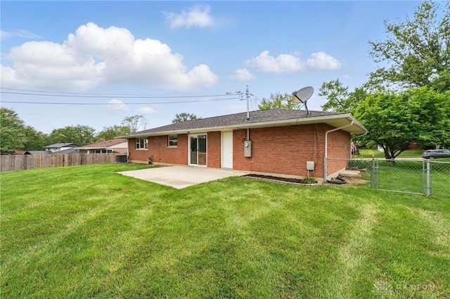 3040 Fontano Dr, Kettering, OH 45440 - rear view of house with a patio area and brick siding