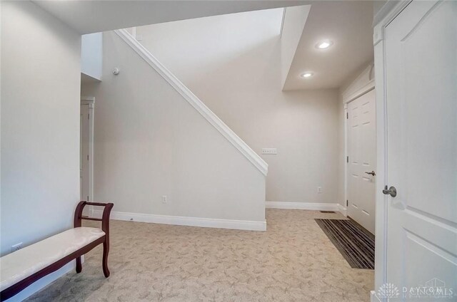 5829 Watt Rd, Camden, OH 45311 - stairs featuring recessed lighting, carpet flooring, and baseboards