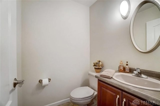 5829 Watt Rd, Camden, OH 45311 - half bathroom featuring vanity and toilet