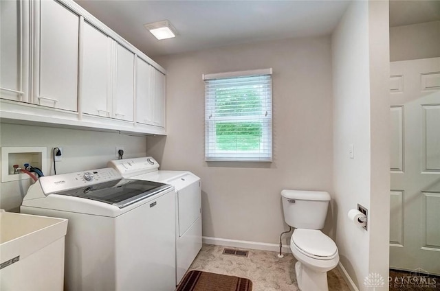5829 Watt Rd, Camden, OH 45311 - laundry room with washer and dryer and baseboards