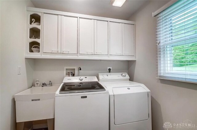 5829 Watt Rd, Camden, OH 45311 - washroom featuring washer and clothes dryer and cabinet space