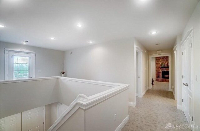 5829 Watt Rd, Camden, OH 45311 - hall featuring light carpet, baseboards, and recessed lighting