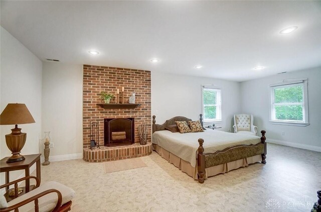 5829 Watt Rd, Camden, OH 45311 - bedroom featuring multiple windows, recessed lighting, a brick fireplace, and baseboards