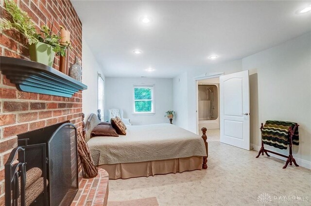 5829 Watt Rd, Camden, OH 45311 - bedroom with a brick fireplace, carpet flooring, recessed lighting, and baseboards