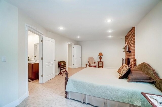 5829 Watt Rd, Camden, OH 45311 - bedroom featuring light colored carpet, recessed lighting, baseboards, and connected bathroom
