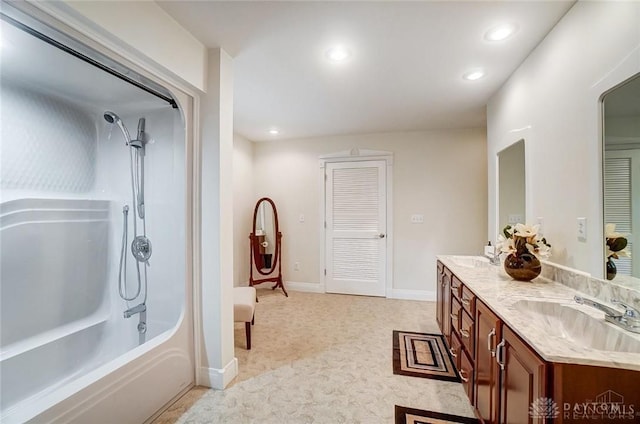5829 Watt Rd, Camden, OH 45311 - bathroom with double vanity, recessed lighting, washtub / shower combination, and baseboards