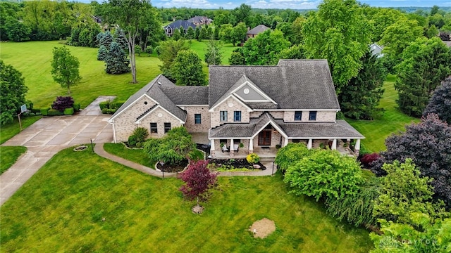 2429 Passage Key Trl, Xenia, OH 45385 - aerial view of property and surrounding area with a tree filled landscape