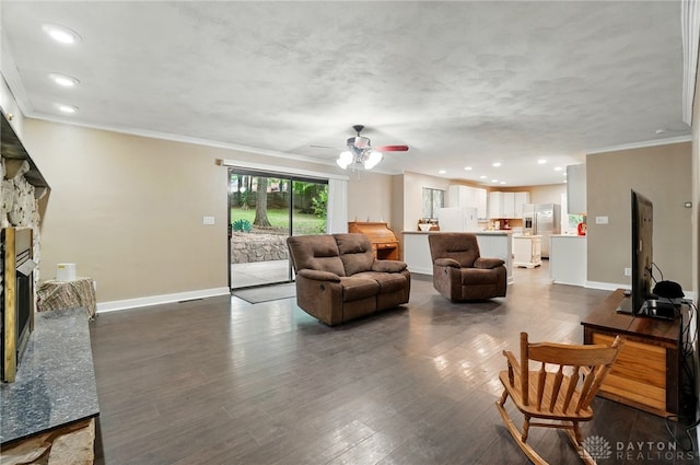 2942 Stauffer Dr, Beavercreek, OH 45434 - living room featuring ornamental molding, baseboards, a ceiling fan, recessed lighting, and dark wood-style floors