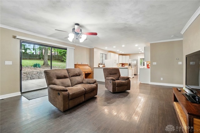2942 Stauffer Dr, Beavercreek, OH 45434 - living room with plenty of natural light, dark wood-type flooring, a ceiling fan, baseboards, and ornamental molding