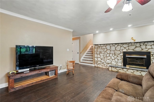 2942 Stauffer Dr, Beavercreek, OH 45434 - living room featuring ceiling fan, baseboards, stairway, crown molding, and wood finished floors