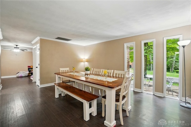 2942 Stauffer Dr, Beavercreek, OH 45434 - dining area with ornamental molding, dark wood-style flooring, baseboards, and ceiling fan