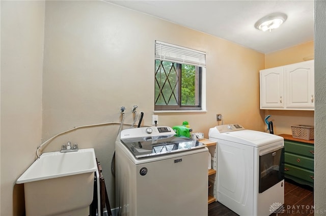 2942 Stauffer Dr, Beavercreek, OH 45434 - laundry area with washer and dryer and cabinet space
