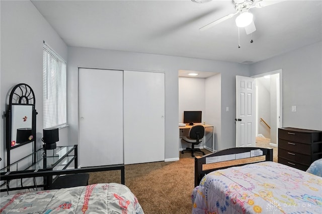 2942 Stauffer Dr, Beavercreek, OH 45434 - bedroom featuring a desk, carpet floors, a closet, a ceiling fan, and baseboards