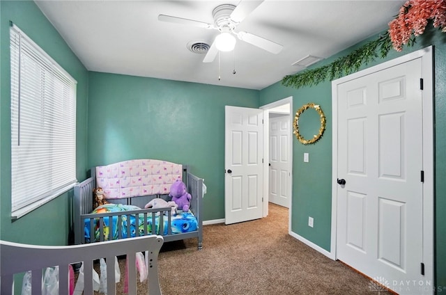 2942 Stauffer Dr, Beavercreek, OH 45434 - carpeted bedroom featuring a ceiling fan and baseboards