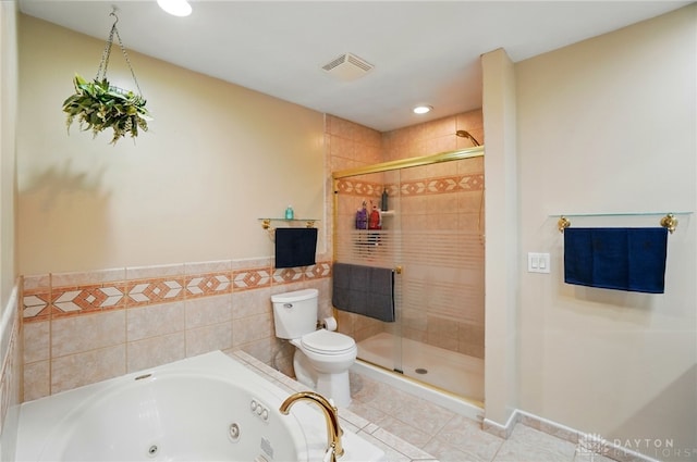 2942 Stauffer Dr, Beavercreek, OH 45434 - full bath featuring toilet, a whirlpool tub, a shower stall, tile patterned flooring, and recessed lighting