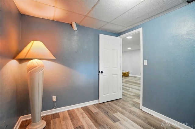 2942 Stauffer Dr, Beavercreek, OH 45434 - unfurnished room with wood finished floors, baseboards, and a drop ceiling