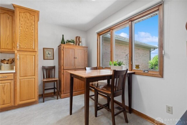 1462 Dee Anne Dr, Xenia, OH 45385 - dining area with baseboards