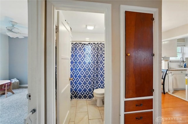 448 Triangle Ave, Oakwood, OH 45419 - bathroom with ceiling fan and curtained shower