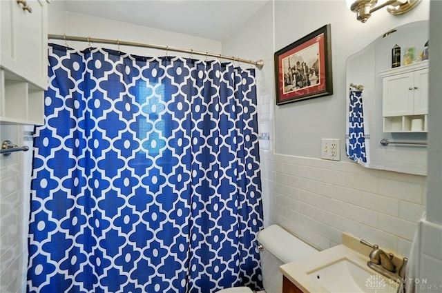448 Triangle Ave, Oakwood, OH 45419 - bathroom with tile walls, vanity, and a shower with curtain