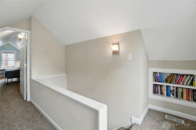 448 Triangle Ave, Oakwood, OH 45419 - corridor featuring carpet floors, vaulted ceiling, and an upstairs landing