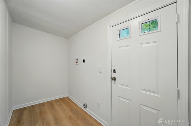 665 Diamond Loop, Middletown, OH 45044 - laundry room featuring electric dryer hookup, wood finished floors, washer hookup, baseboards, and ornamental molding