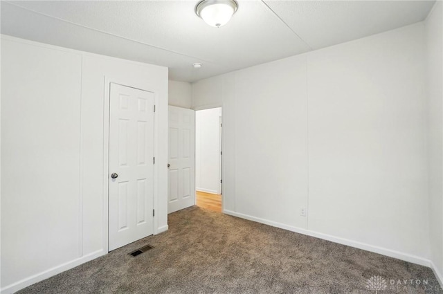 665 Diamond Loop, Middletown, OH 45044 - unfurnished bedroom with carpet and baseboards