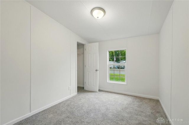 665 Diamond Loop, Middletown, OH 45044 - carpeted empty room featuring baseboards