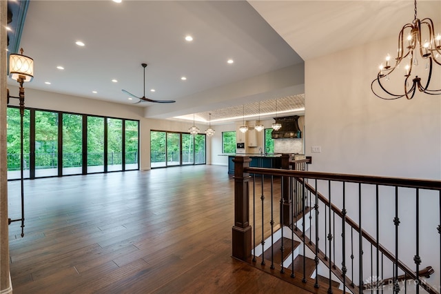 6481 Stagecoach Way, Liberty Twp, OH 45011 - hallway featuring a chandelier, recessed lighting, dark wood finished floors, and an upstairs landing