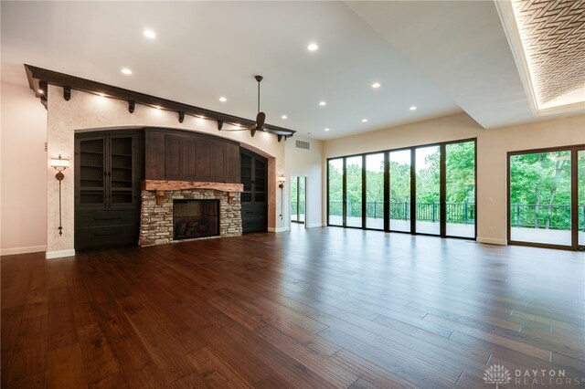 6481 Stagecoach Way, Liberty Twp, OH 45011 - unfurnished living room with baseboards, a fireplace, dark wood-type flooring, and recessed lighting