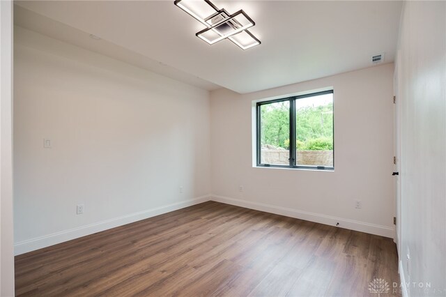 6481 Stagecoach Way, Liberty Twp, OH 45011 - spare room featuring wood finished floors and baseboards