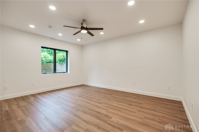 6481 Stagecoach Way, Liberty Twp, OH 45011 - empty room featuring a ceiling fan, recessed lighting, light wood-style floors, and baseboards