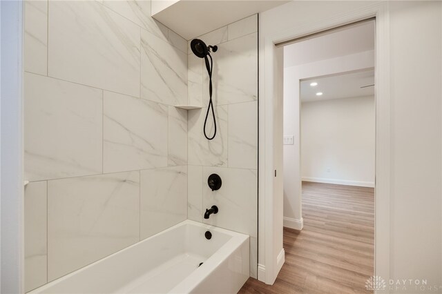 6481 Stagecoach Way, Liberty Twp, OH 45011 - full bathroom with tub / shower combination, baseboards, wood finished floors, and recessed lighting