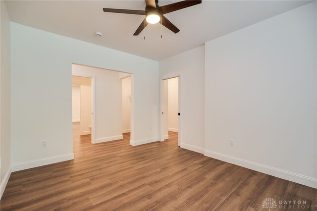 6481 Stagecoach Way, Liberty Twp, OH 45011 - unfurnished bedroom with wood finished floors, baseboards, and ceiling fan