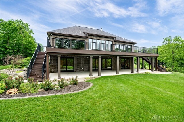 6481 Stagecoach Way, Liberty Twp, OH 45011 - back of property with stairway, a patio, a yard, and a deck