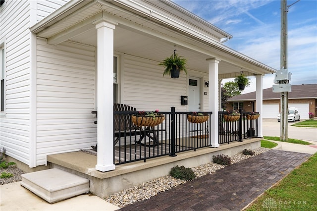 602 W N St, Arcanum, OH 45304 - property entrance featuring covered porch